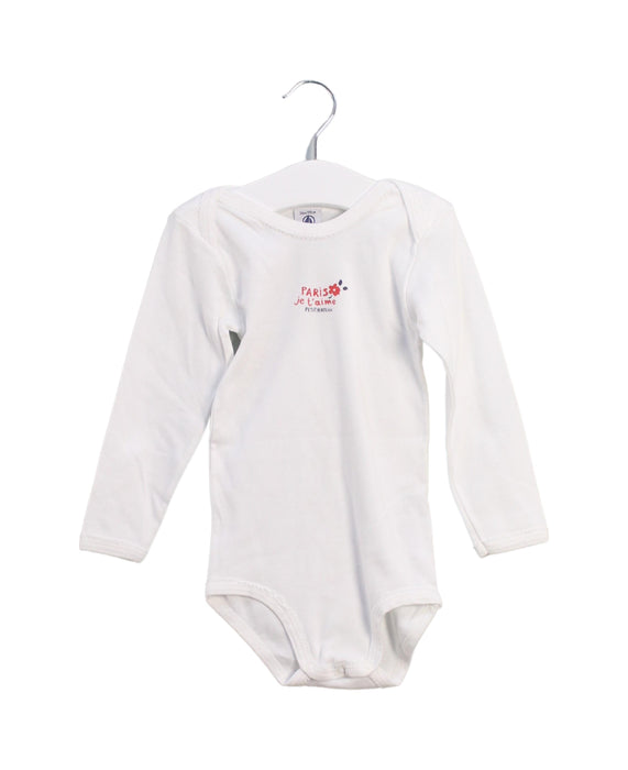 A White Long Sleeve Bodysuits from Petit Bateau in size 3T for girl. (Front View)