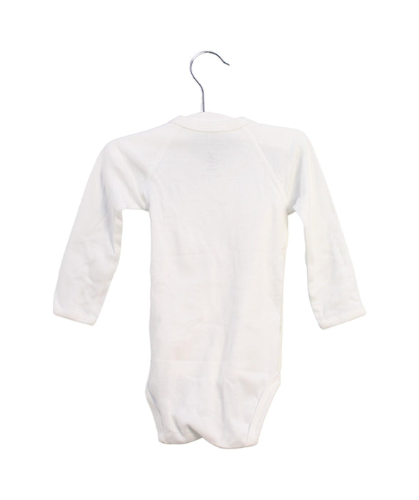 A White Long Sleeve Bodysuits from Petit Bateau in size 6-12M for neutral. (Back View)