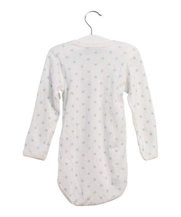 A White Long Sleeve Bodysuits from Petit Bateau in size 2T for girl. (Back View)