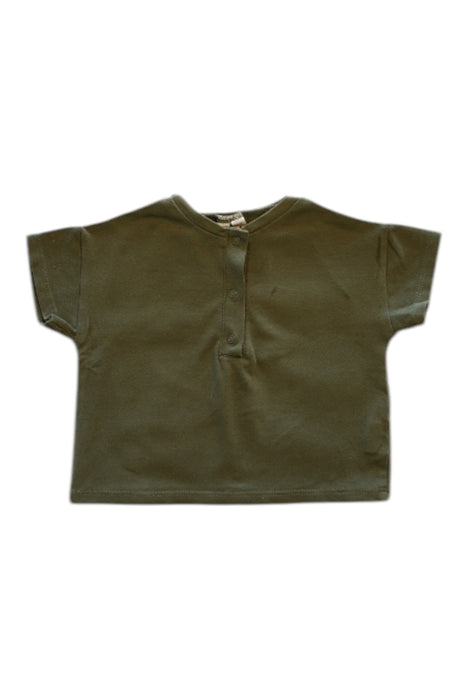 A Green Short Sleeve Tops from Gray Label in size 3-6M for neutral. (Front View)