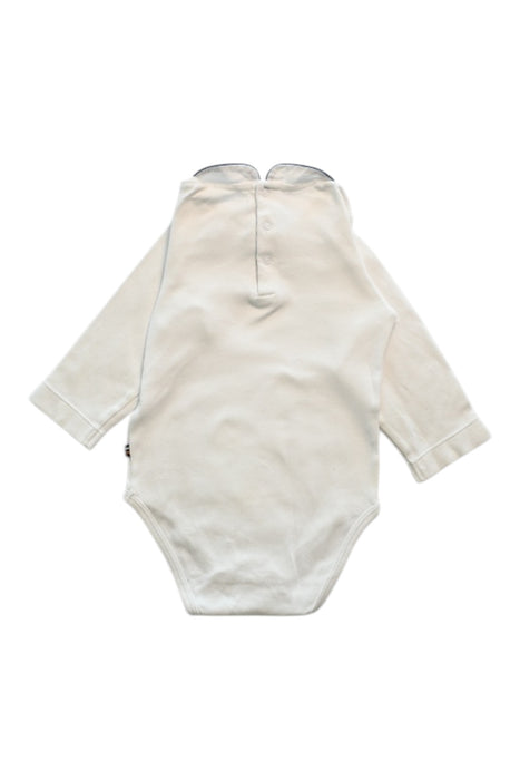 A White Long Sleeve Bodysuits from Jacadi in size 6-12M for boy. (Back View)