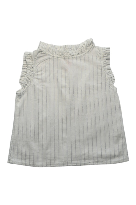 A White Sleeveless Tops from Bonpoint in size 6T for girl. (Front View)