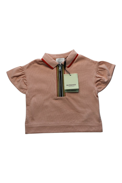 A Pink Short Sleeve Polos from Burberry in size 2T for girl. (Front View)