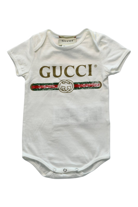 A White Short Sleeve Bodysuits from Gucci in size 0-3M for girl. (Front View)