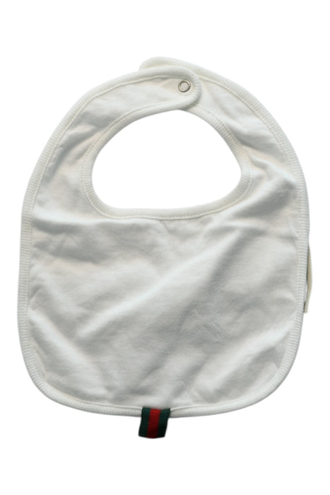 A White Bibs from Gucci in size 0-3M for girl. (Front View)