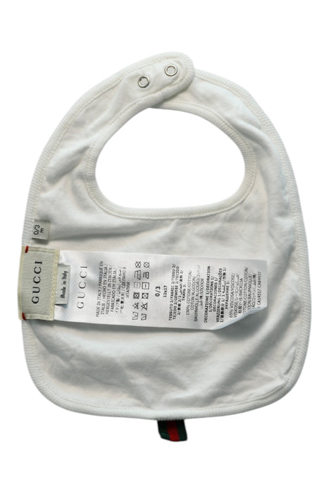 A White Bibs from Gucci in size 0-3M for girl. (Back View)