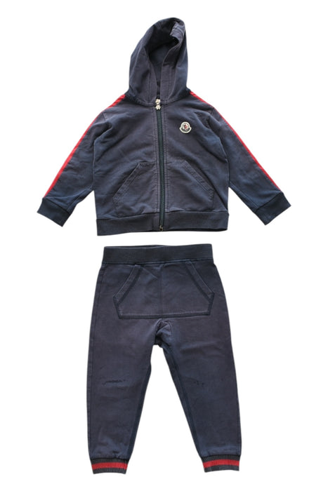 A Navy Pants Sets from Moncler in size 2T for girl. (Front View)
