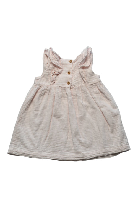 A Ivory Sleeveless Dresses from The Little White Company in size 6-12M for girl. (Back View)