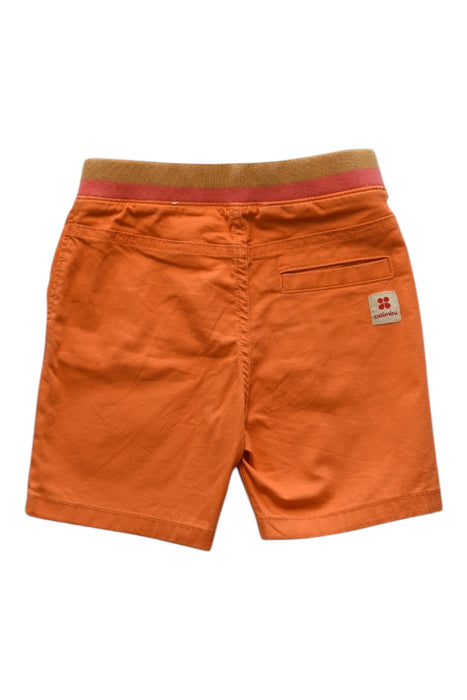 A Orange Shorts from Catimini in size 4T for boy. (Back View)