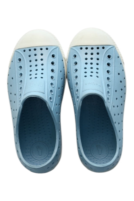 A Blue Slip Ons from Native Shoes in size 5T for girl. (Front View)