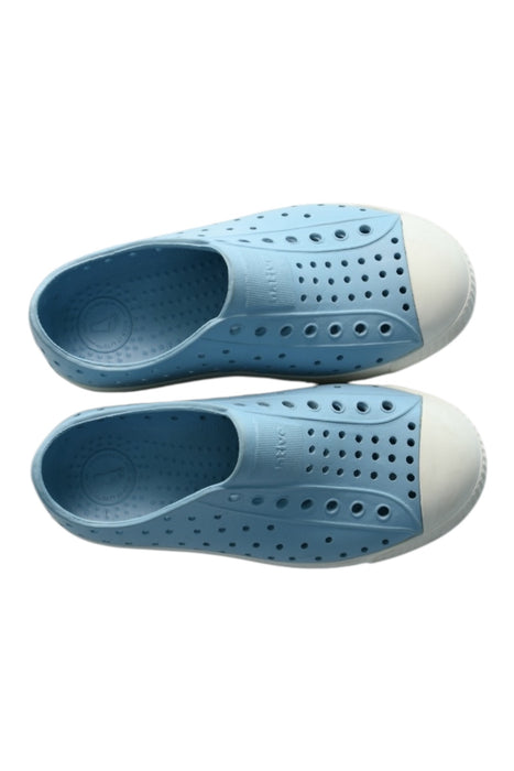 A Blue Slip Ons from Native Shoes in size 5T for girl. (Back View)