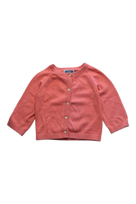 A Peach Cardigans from Jacadi in size 6-12M for girl. (Front View)