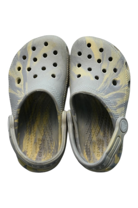 A Grey Slip Ons from Crocs in size 3T for girl. (Front View)