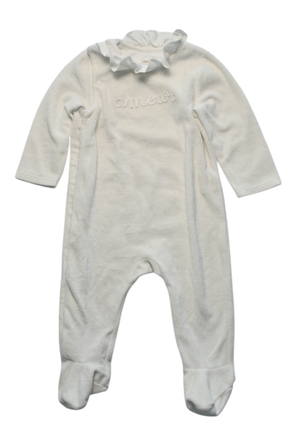 A White Onesies from Absorba in size 6-12M for girl. (Front View)