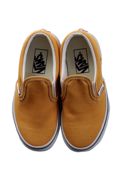 A Yellow Slip Ons from Retykle in size Newborn for neutral. (Back View)
