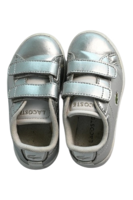 A Silver Sneakers from Lacoste in size 12-18M for girl. (Front View)