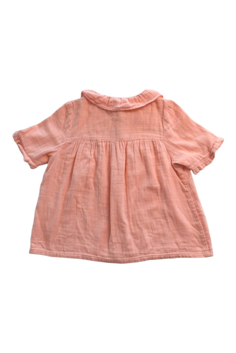 A Peach Short Sleeve Shirts from Cyrillus in size 8Y for girl. (Back View)