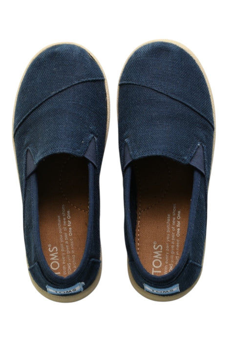 A Navy Slip Ons from Toms in size 7Y for boy. (Front View)