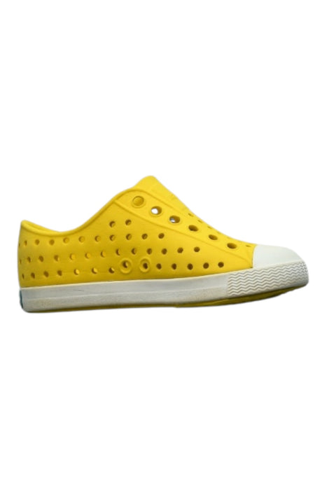 A Yellow Flats from Native Shoes in size 18-24M for neutral. (Back View)
