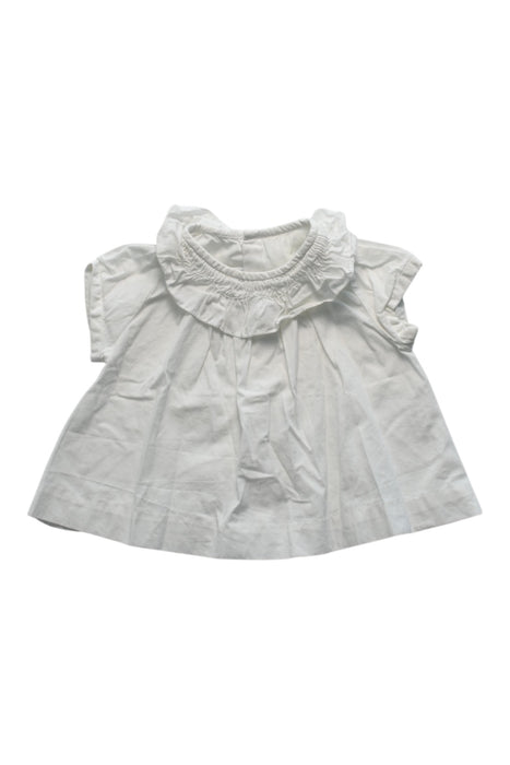 A White Short Sleeve Tops from Jacadi in size 6-12M for girl. (Front View)