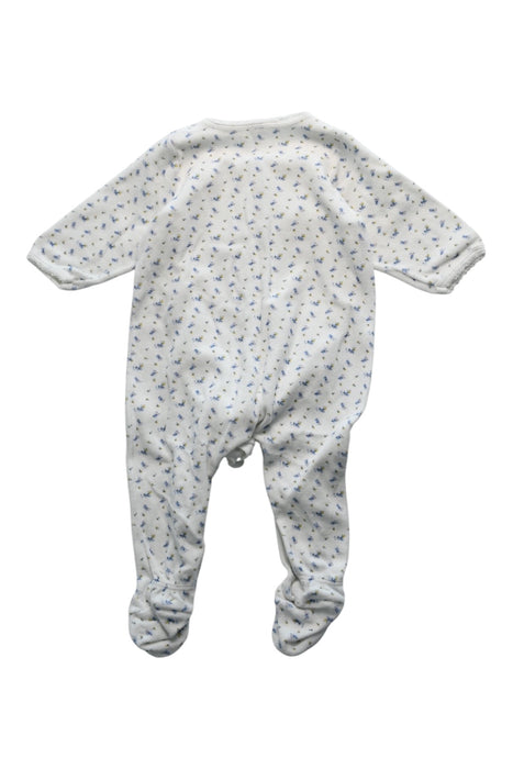 A White Onesies from Petit Bateau in size 3-6M for girl. (Back View)