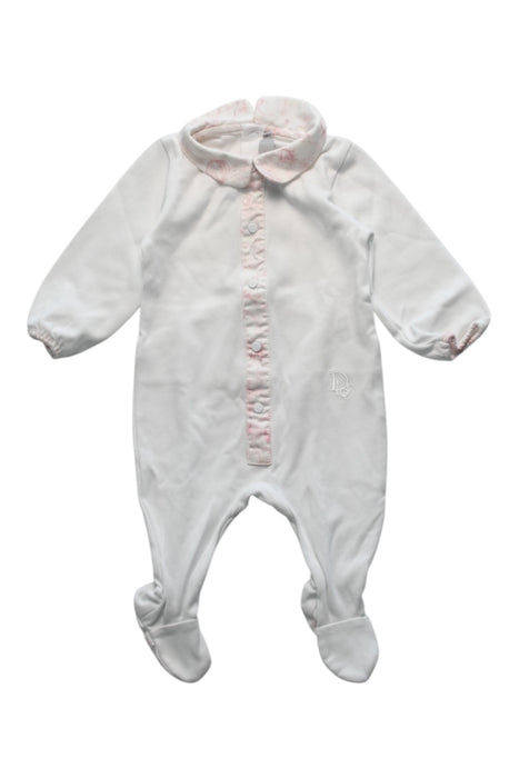 A White Onesies from Dior in size 0-3M for girl. (Front View)