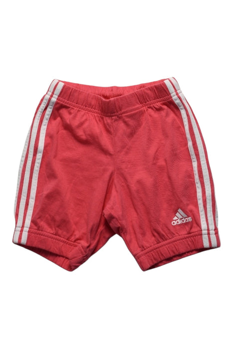 A Red Shorts from Adidas in size 3T for girl. (Front View)