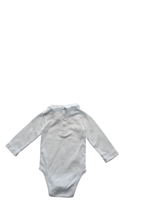 A White Long Sleeve Bodysuits from Jacadi in size 3-6M for girl. (Back View)