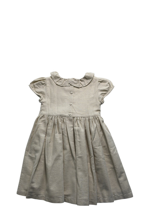 A Ivory Short Sleeve Dresses from Lily Rose in size 5T for girl. (Back View)