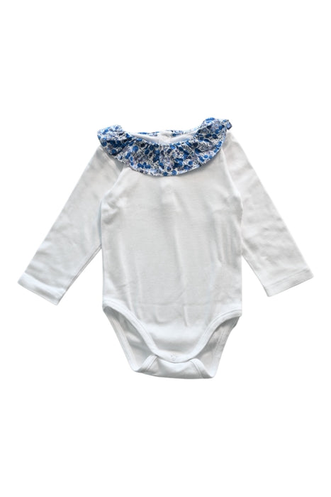 A White Long Sleeve Bodysuits from Jacadi in size 6-12M for girl. (Front View)