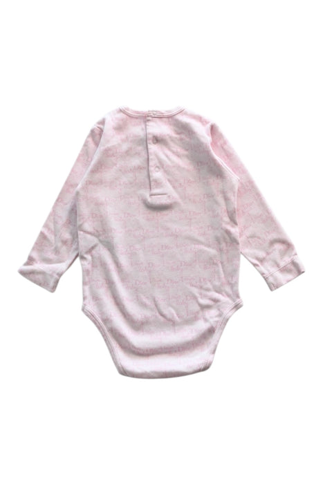 A Pink Long Sleeve Bodysuits from Dior in size 6-12M for girl. (Back View)