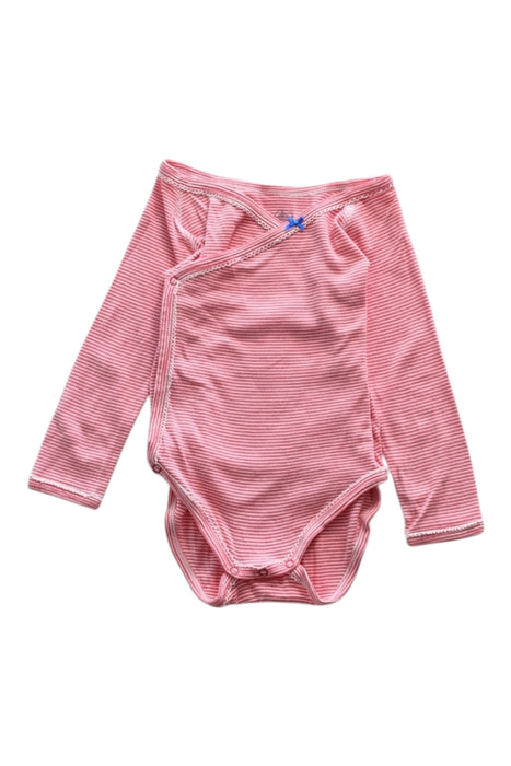 A Pink Long Sleeve Bodysuits from Petit Bateau in size 6-12M for girl. (Front View)