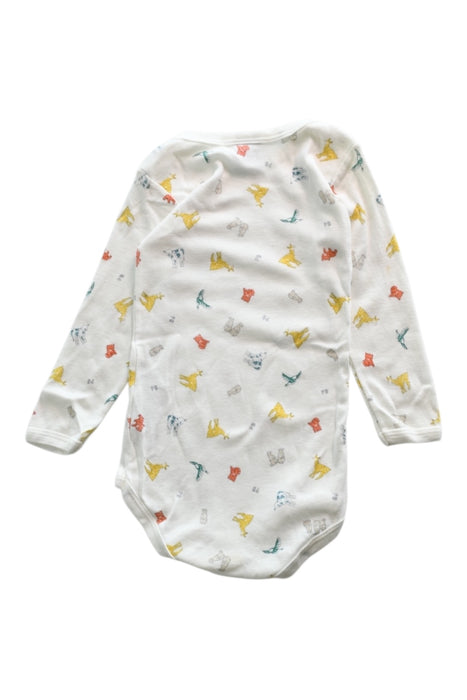 A White Long Sleeve Bodysuits from Petit Bateau in size 12-18M for neutral. (Back View)