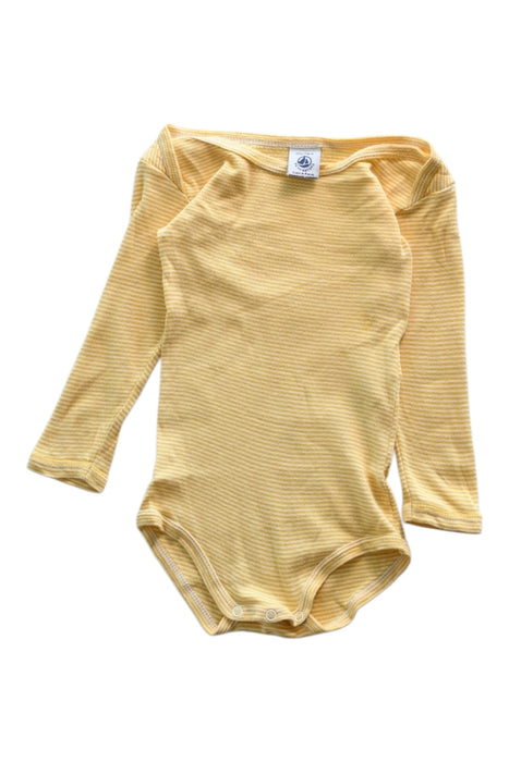 A Yellow Long Sleeve Bodysuits from Petit Bateau in size 6-12M for boy. (Front View)