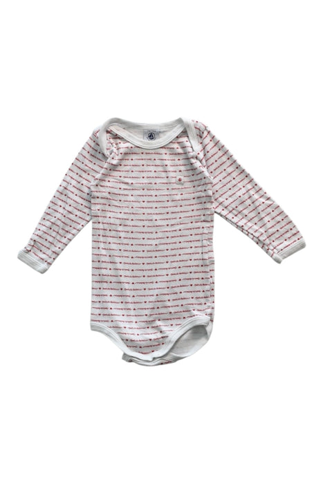 A White Long Sleeve Bodysuits from Petit Bateau in size 6-12M for girl. (Front View)