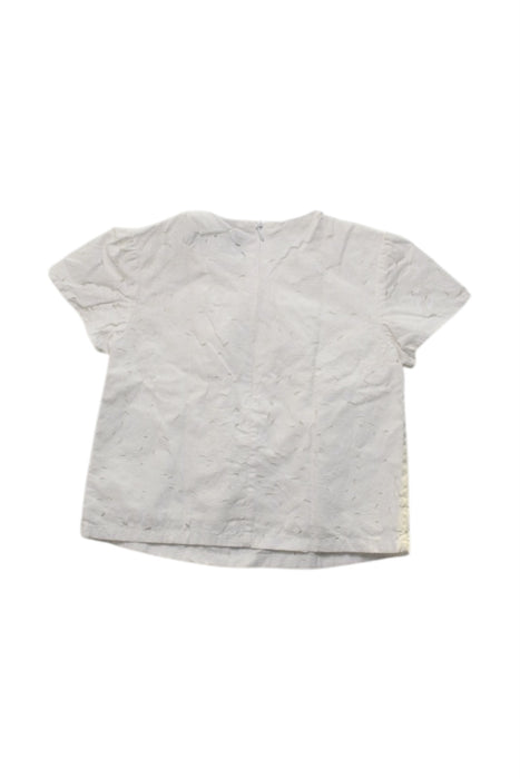 A White Short Sleeve Tops from Young Versace in size 5T for girl. (Back View)