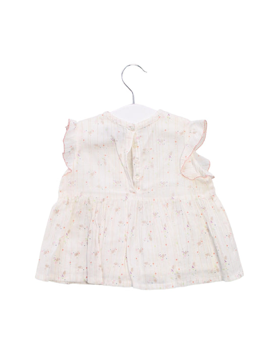 A White Sleeveless Tops from Velveteen in size 12-18M for girl. (Back View)