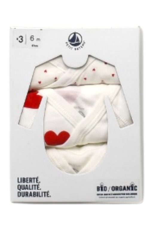 A White Long Sleeve Bodysuits from Petit Bateau in size 3-6M for girl. (Front View)