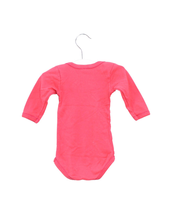 A Pink Long Sleeve Bodysuits from Petit Bateau in size 0-3M for girl. (Back View)