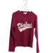 A Pink Long Sleeve Tops from DKNY in size 8Y for girl. (Front View)