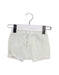 A Green Shorts from Petit Bateau in size 12-18M for girl. (Front View)
