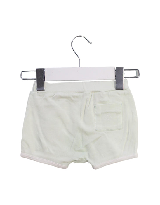 A Green Shorts from Petit Bateau in size 12-18M for girl. (Back View)