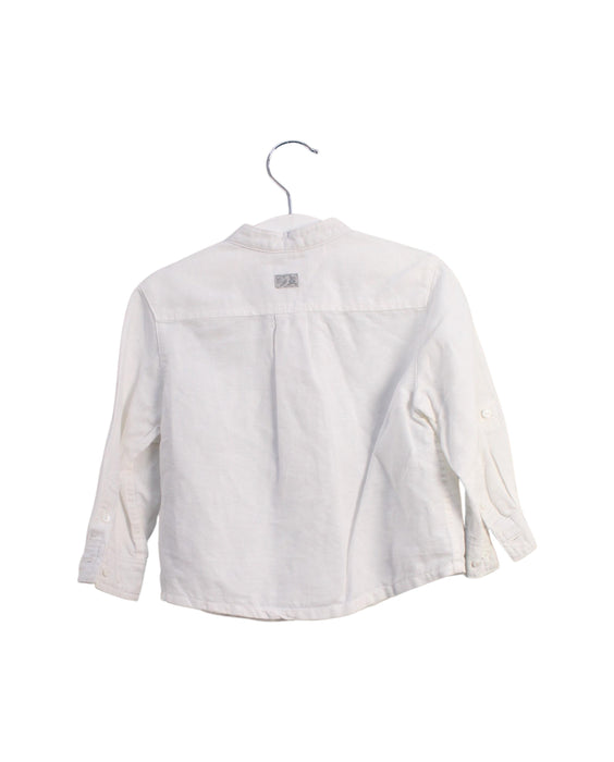 A White Shirts from Cyrillus in size 12-18M for boy. (Back View)