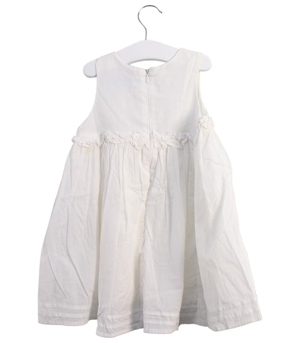 A White Sleeveless Dresses from Tartine et Chocolat in size 5T for girl. (Back View)